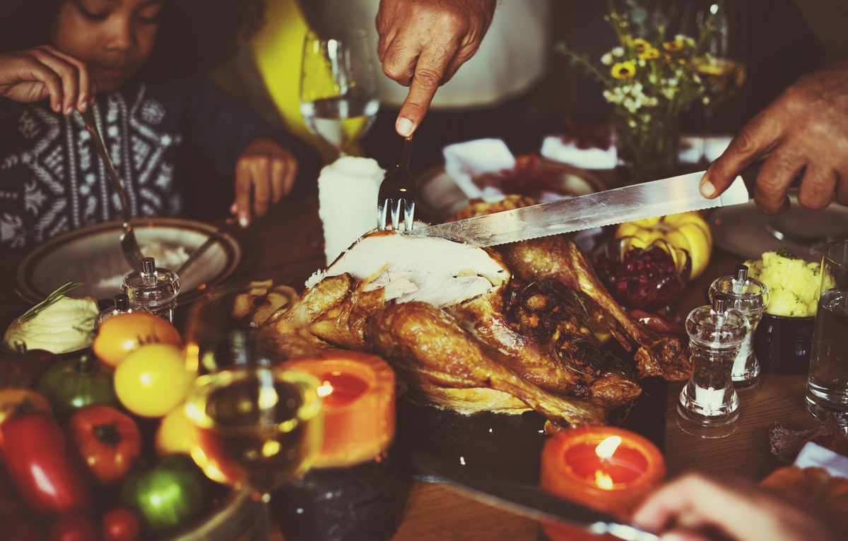 A man cutting turkey