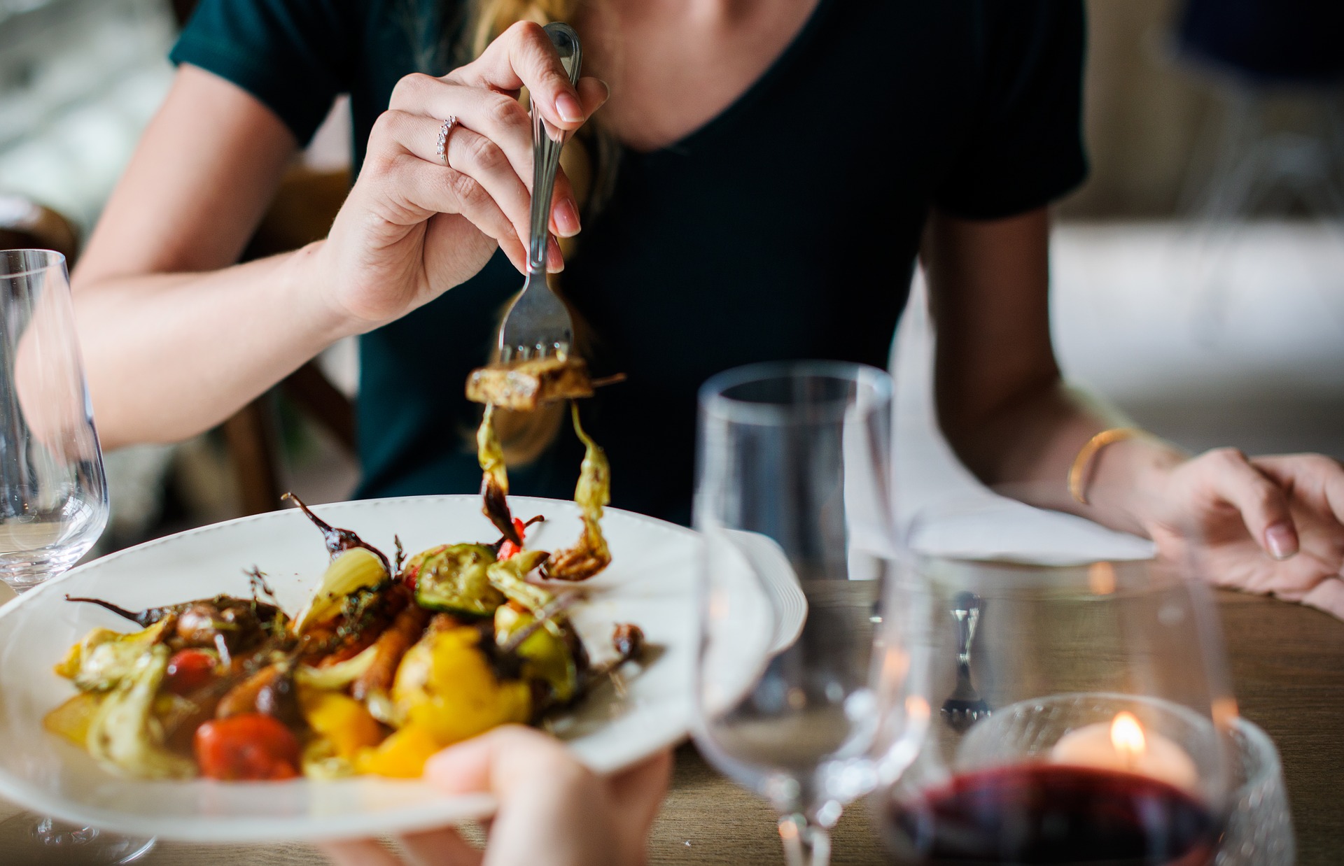 Woman eating food in a restaurant