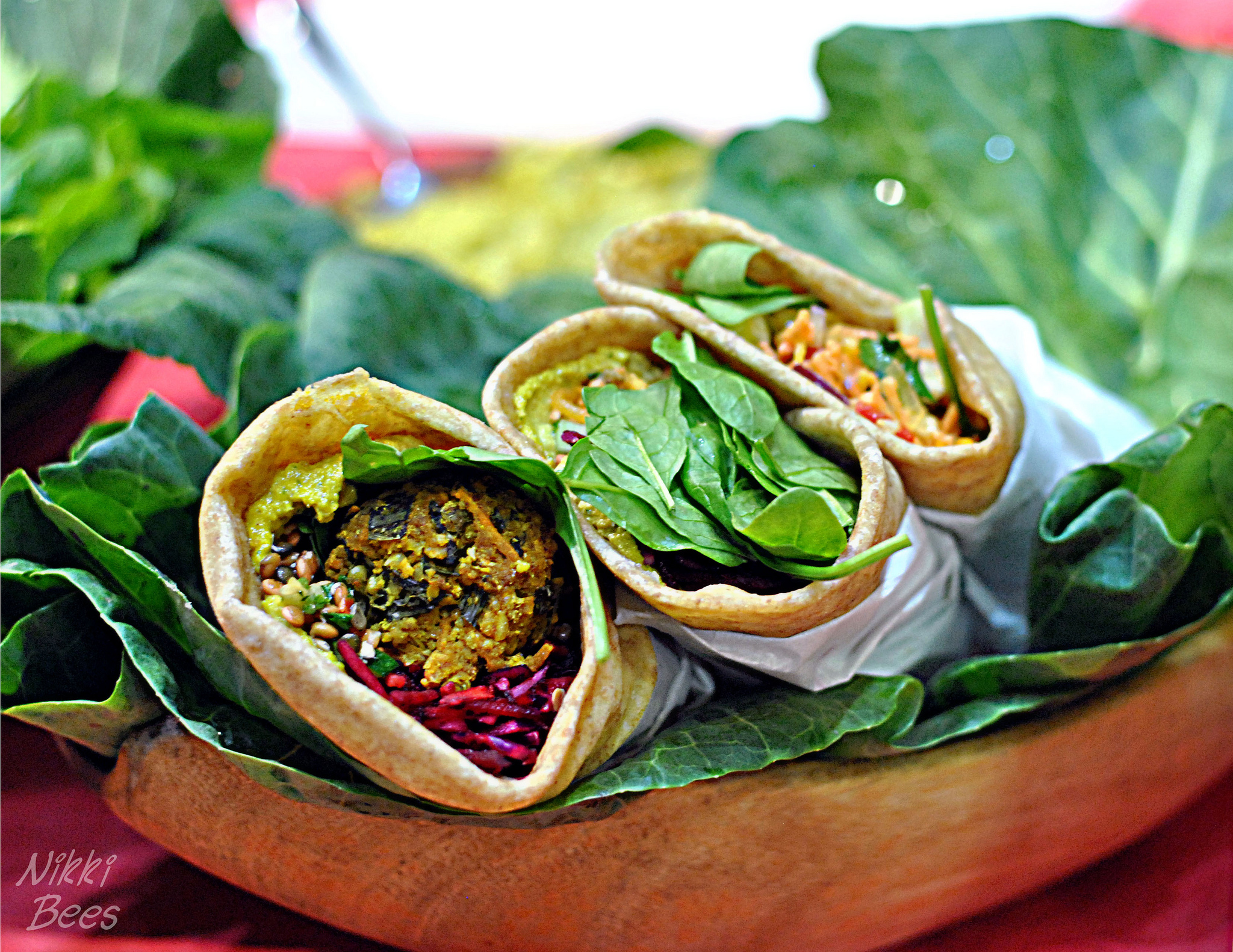 A vegan wrap on salad leaves